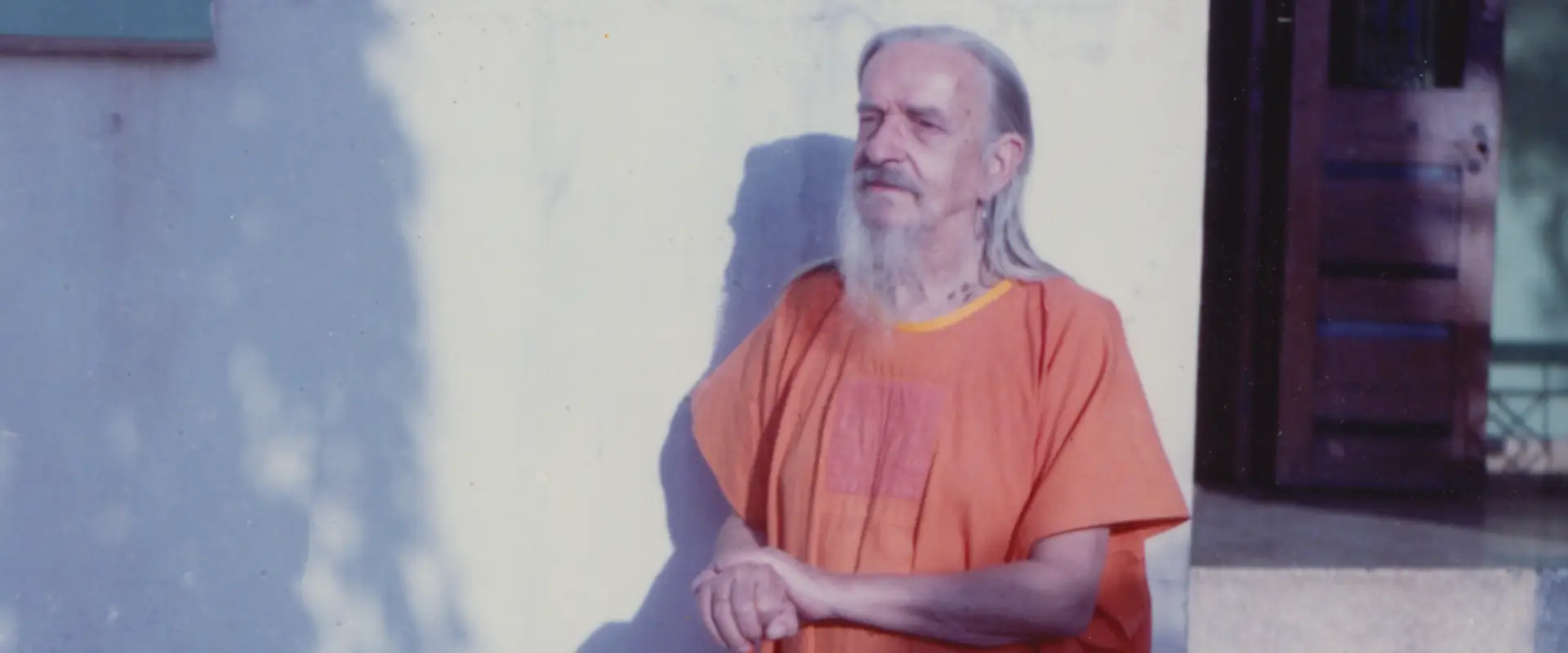 Shri Gurudev Mahendranath, standing on porch